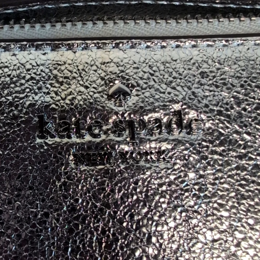 Kate Spade Lucy Small Silver Zip Around Wristlet Retail $99